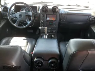 2005 Hummer H2 SUV with VIN 5GRGN23U35H132428, listed as a Copart auction lot 74594554 with 107,701 mi miles and Salvage Title. Bid and sale history available at carsss.com. Image 8.