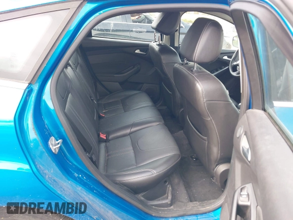 2014 Ford Focus Titanium with VIN 1FADP3N28EL119791, listed as a IAAI auction lot 42712044 with 144,338 mi miles and . Bid and sale history available at DreamBid. Image 8.