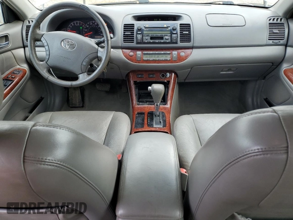 2006 Toyota Camry STD with VIN 4T1BE30KX6U651615, listed as a Copart auction lot 57497475 with 214,031 mi miles and Salvage title. Bid and sale history available at DreamBid. Image 8.