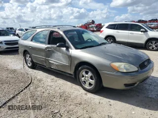 2004 Ford Taurus SE with VIN 1FAFP58204A167229, listed as a Copart auction lot 79826714 with 95,723 mi miles and Non repairable. Bid and sale history available at DreamBid. Image 4.