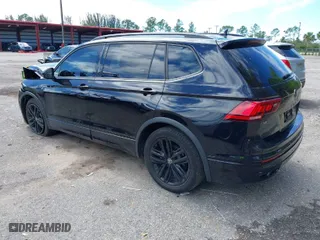 2022 Volkswagen Tiguan SE R-Line Black with VIN 3VVCB7AX9NM054351, listed as a IAAI auction lot 41665235 with 30,971 mi miles. Bid and sale history available at carsss.com. Image 3.