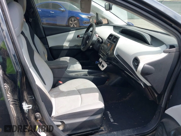 2016 Toyota Prius Two z VIN JTDKBRFU4G3509129, wystawiony jako IAAI lot #42321562 z przebiegiem 246 582 mil mil oraz . Historia ofert i sprzedaży dostępna na DreamBid. Obrazek 5.