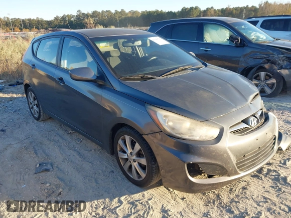 2012 Hyundai Accent SE with VIN KMHCU5AE6CU024465, listed as a IAAI auction lot 41591162 with 168,574 mi miles. Bid and sale history available at carsss.com. Image 1.