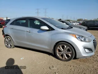 2013 Hyundai Elantra GT with VIN KMHD35LE4DU117801, listed as a Copart auction lot 74888134 with 97,453 mi miles and Salvage Title. Bid and sale history available at carsss.com. Image 4.