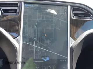 2014 Tesla Model S 60 with VIN 5YJSA1S15EFP29010, listed as a IAAI auction lot 41798180 with 142,754 mi miles and . Bid and sale history available at DreamBid. Image 18.