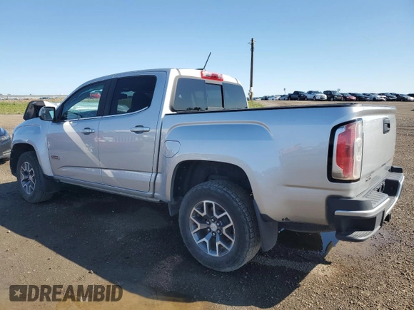 2018 GMC Canyon 4WD All Terrain w/Cloth with VIN 1GTG6CEN0J1203940, listed as a Copart auction lot 62181804 with 102,825 mi miles and Salvage Title. Bid and sale history available at carsss.com. Image 2.