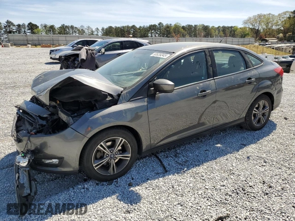 2018 Ford Focus SE with VIN 1FADP3FE9JL278340, listed as a Copart auction lot 50839345 with 83,187 mi miles and Salvage title. Bid and sale history available at DreamBid. Image 1.