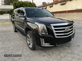 2018 Cadillac Escalade ESV Luxury z VIN 1GYS3HKJ2JR139302, wystawiony jako Copart lot #74639524 z przebiegiem 154 097 mil mil oraz Czysty tytuł • Clean title. Historia ofert i sprzedaży dostępna na DreamBid. Obrazek 1.