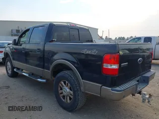 2004 Ford F-150 XLT with VIN 1FTPW14554KC93459, listed as a IAAI auction lot 41673091 with 239,519 mi miles. Bid and sale history available at carsss.com. Image 3.