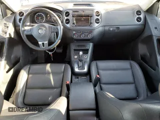 2014 Volkswagen Tiguan SE z VIN WVGAV3AXXEW505398, wystawiony jako Copart lot #41682155 z przebiegiem 137 147 mil mil oraz Nie do naprawy • Non repairable. Historia ofert i sprzedaży dostępna na DreamBid. Obrazek 8.