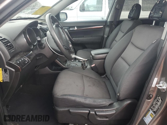 2012 Kia Sorento LX with VIN 5XYKT3A19CG282243, listed as a Copart auction lot 51784965 with 162,952 mi miles and Salvage Title. Bid and sale history available at DreamBid. Image 7.