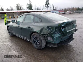 2023 BMW i4 eDrive35 z VIN WBY43AW04PFR19351, wystawiony jako IAAI lot #41841961 z przebiegiem 28 175 mil mil oraz . Historia ofert i sprzedaży dostępna na DreamBid. Obrazek 3.