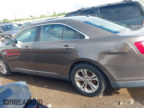 2015 Ford Taurus SEL with VIN 1FAHP2E87FG194170, listed as a IAAI auction lot 42184749 with 222,609 mi miles and . Bid and sale history available at carsss.com. Image 14.