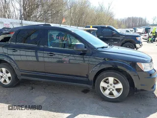 2013 Dodge Journey American Value with VIN 3C4PDCAB8DT577064, listed as a IAAI auction lot 42087623 with 143,044 mi miles and . Bid and sale history available at DreamBid. Image 13.