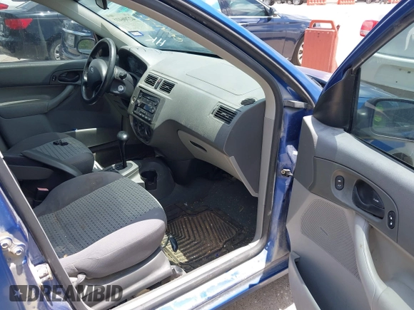 2005 Ford Focus S with VIN 1FAFP34N65W158687, listed as a IAAI auction lot 42706418 with Not provided miles and . Bid and sale history available at DreamBid. Image 5.