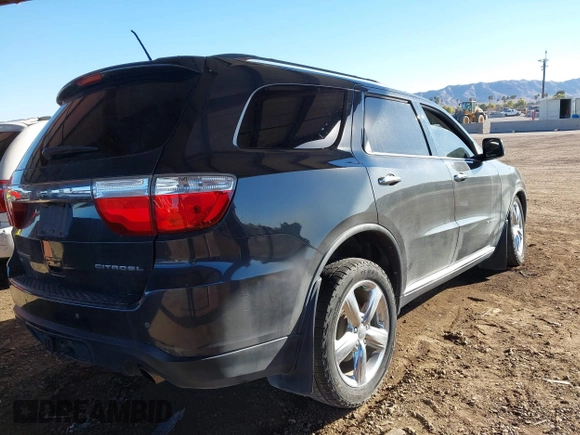 2011 Dodge Durango Citadel with VIN 1D4SE5GT5BC614215, listed as a IAAI auction lot 41399251 with 157,797 mi miles. Bid and sale history available at carsss.com. Image 4.
