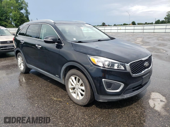 2017 Kia Sorento LX z VIN 5XYPGDA34HG305081, wystawiony jako Copart lot #60938125 z przebiegiem 132 764 mil mil oraz Czysty tytuł • Clean title. Historia ofert i sprzedaży dostępna na DreamBid. Obrazek 4.
