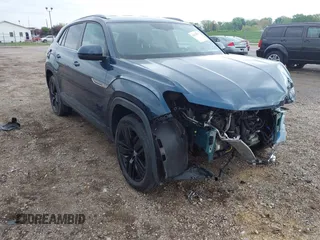 2021 Volkswagen Atlas SE with VIN 1V2LC2CA2MC228525, listed as a IAAI auction lot 42127917 with 74,707 mi miles and . Bid and sale history available at DreamBid. Image 1.