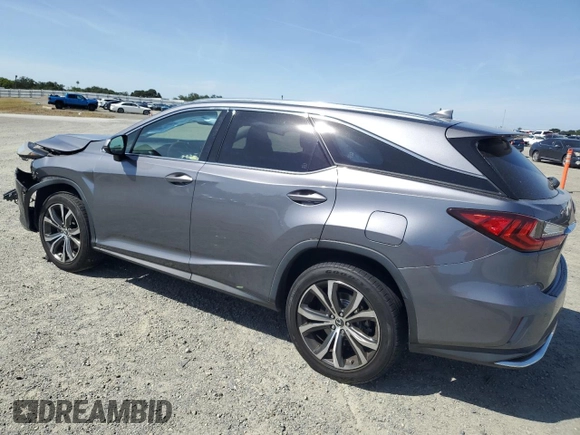 2020 Lexus RX 350L with VIN JTJHZKFA4L2027079, listed as a Copart auction lot 57151485 with 60,890 mi miles and Salvage title. Bid and sale history available at DreamBid. Image 2.