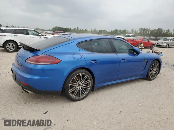 2015 Porsche Panamera 4 z VIN WP0AA2A79FL000515, wystawiony jako Copart lot #51675725 z przebiegiem 54 042 mil mil oraz Szkoda całkowita • Salvage title. Historia ofert i sprzedaży dostępna na DreamBid. Obrazek 3.