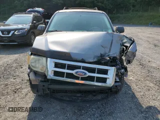 2008 Ford Escape XLS with VIN 1FMCU02Z18KE11979, listed as a Copart auction lot 60212165 with 239,177 mi miles and Salvage title. Bid and sale history available at DreamBid. Image 5.
