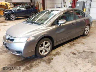 2010 Honda Civic Sdn LX-S with VIN 2HGFA1F69AH537117, listed as a IAAI auction lot 41960907 with 133,981 mi miles. Bid and sale history available at carsss.com. Image 2.