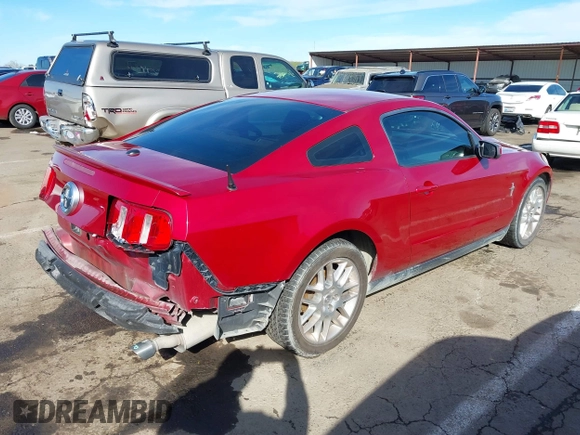 2012 Ford Mustang V6 Premium with VIN 1ZVBP8AM7C5270903, listed as a IAAI auction lot 41631200 with 171,138 mi miles. Bid and sale history available at carsss.com. Image 4.