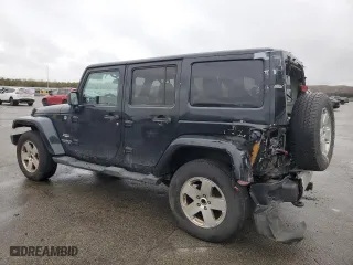 2012 Jeep Wrangler Unlimited Sahara with VIN 1C4HJWEG0CL163310, listed as a Copart auction lot 48972825 with 125,934 mi miles and Salvage Title. Bid and sale history available at carsss.com. Image 2.