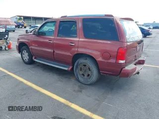 2003 Cadillac Escalade z VIN 1GYEK63N53R183593, wystawiony jako IAAI lot #42438258 z przebiegiem 74 561 mil mil oraz . Historia ofert i sprzedaży dostępna na DreamBid. Obrazek 3.