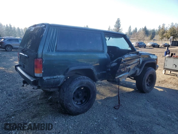 1999 Jeep Cherokee SE with VIN 1J4FF27S9XL667941, listed as a Copart auction lot 42429785 with 121,490 mi miles and Salvage title. Bid and sale history available at DreamBid. Image 3.