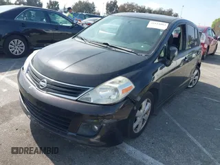 2012 Nissan Versa S with VIN 3N1BC1CP4CK203309, listed as a IAAI auction lot 41614884 with 141,770 mi miles. Bid and sale history available at carsss.com. Image 2.