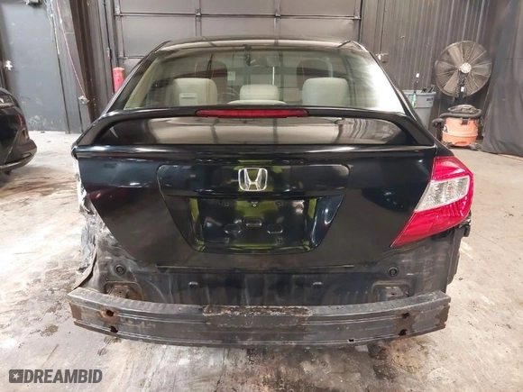 2012 Honda Civic Sdn LX with VIN 2HGFB2F56CH583324, listed as a IAAI auction lot 41899338 with 121,743 mi miles. Bid and sale history available at carsss.com. Image 17.