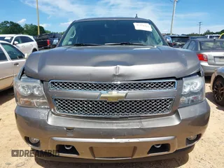 2011 Chevrolet Suburban LTZ with VIN 1GNSKKE3XBR394436, listed as a IAAI auction lot 42324225 with 132,871 mi miles and . Bid and sale history available at DreamBid. Image 12.