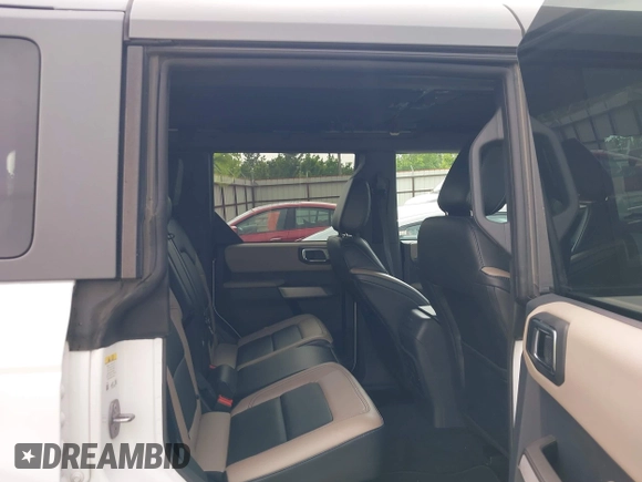 2023 Ford Bronco z VIN 1FMEE5DP2PLB16493, wystawiony jako IAAI lot #42507079 z przebiegiem 59 656 mil mil oraz . Historia ofert i sprzedaży dostępna na DreamBid. Obrazek 8.