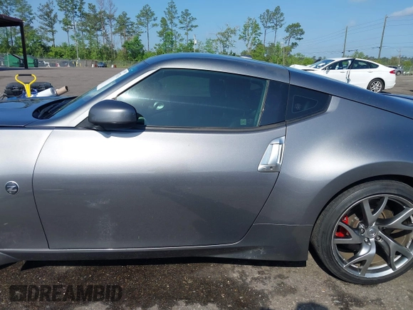 2013 Nissan 370Z with VIN JN1AZ4EH1DM880983, listed as a IAAI auction lot 41937876 with 130,613 mi miles. Bid and sale history available at carsss.com. Image 14.