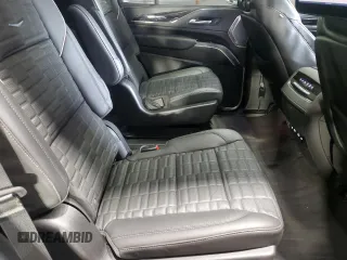2024 Cadillac Escalade AWD V-Series z VIN 1GYS4HK92RR234960, wystawiony jako Copart lot #51802235 z przebiegiem 16 034 mil mil oraz Nie do naprawy. Historia ofert i sprzedaży dostępna na DreamBid. Obrazek 11.