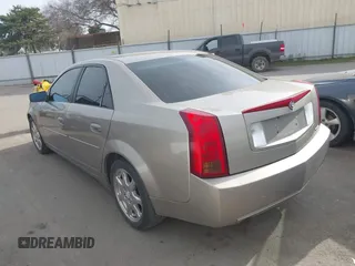 2003 Cadillac CTS with VIN 1G6DM57N730116792, listed as a IAAI auction lot 41686845 with 121,590 mi miles. Bid and sale history available at carsss.com. Image 3.