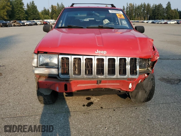 1996 Jeep Grand Cherokee z VIN 1J4EZ58Y5TC142263, wystawiony jako Copart lot #70532894 z przebiegiem Nie podano mil oraz Szkoda całkowita • Salvage title. Historia ofert i sprzedaży dostępna na DreamBid. Obrazek 5.
