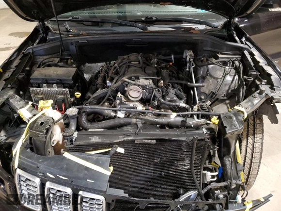 2019 Jeep Grand Cherokee Summit with VIN 1C4RJFJT7KC575200, listed as a Copart auction lot 82087644 with 122,358 mi miles and Salvage Title. Bid and sale history available at carsss.com. Image 12.