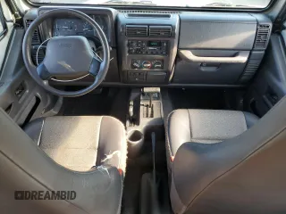 2000 Jeep Wrangler SE with VIN 1J4FA29P3YP770094, listed as a Copart auction lot 65419385 with 150,364 mi miles and Clean title. Bid and sale history available at DreamBid. Image 8.