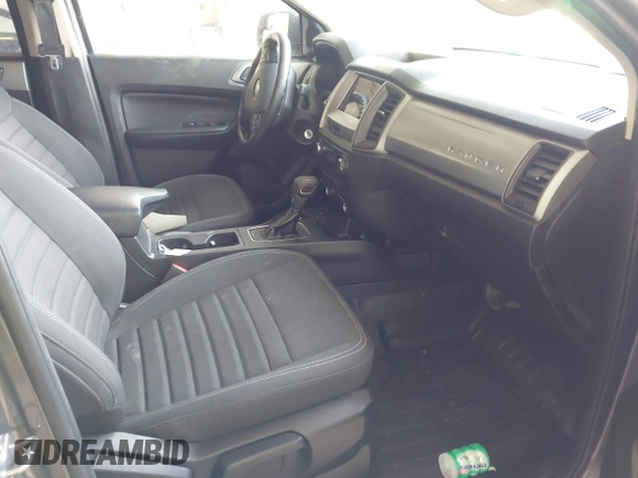 2023 Ford Ranger XL with VIN 1FTER4FH7PLE23750, listed as a IAAI auction lot 42008399 with 52,359 mi miles and . Bid and sale history available at DreamBid. Image 5.