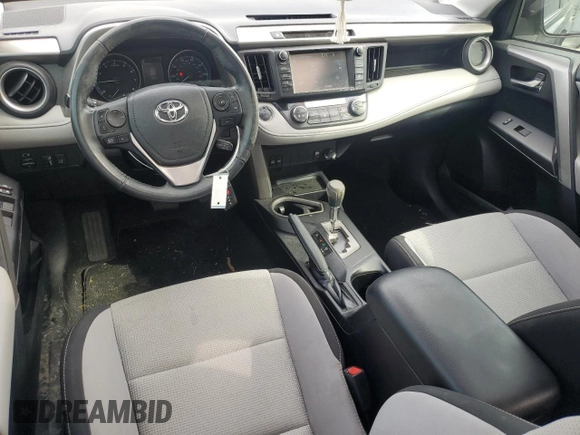 2018 Toyota RAV4 XLE with VIN 2T3WFREV3JW469307, listed as a Copart auction lot 57092295 with 47,639 mi miles and Salvage title. Bid and sale history available at DreamBid. Image 8.