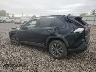 2024 Toyota RAV4 Hybrid XLE Premium z VIN 4T3B6RFVXRU173774, wystawiony jako Copart lot #57258085 z przebiegiem Nie podano mil oraz Szkoda całkowita • Salvage title. Historia ofert i sprzedaży dostępna na DreamBid. Obrazek 2.