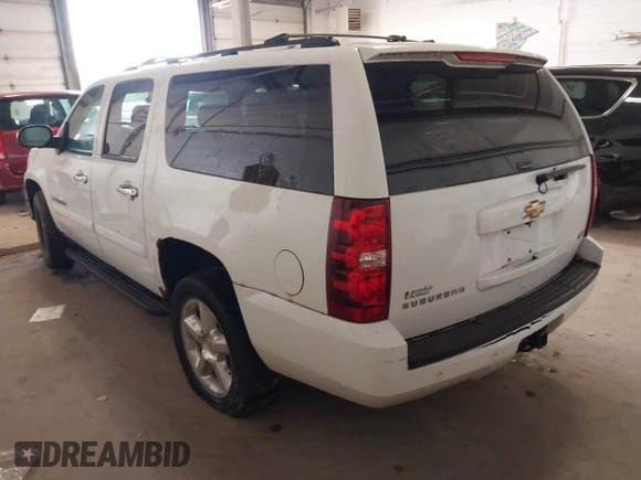 2007 Chevrolet Suburban LT with VIN 1GNFK16387J352797, listed as a IAAI auction lot 42310897 with 208,836 mi miles and . Bid and sale history available at DreamBid. Image 3.