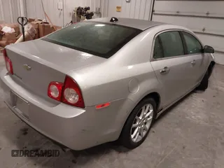 2012 Chevrolet Malibu LTZ with VIN 1G1ZG5E77CF375464, listed as a IAAI auction lot 41509140 with 197,329 mi miles and . Bid and sale history available at DreamBid. Image 4.