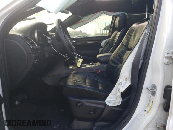 2019 Jeep Grand Cherokee Overland with VIN 1C4RJFCG1KC592252, listed as a Copart auction lot 86572234 with 149,446 mi miles and Salvage Title. Bid and sale history available at carsss.com. Image 7.
