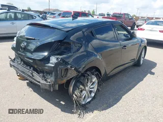 2013 Hyundai Veloster w/Gray Int with VIN KMHTC6AD1DU154946, listed as a IAAI auction lot 42375871 with 108,095 mi miles and . Bid and sale history available at DreamBid. Image 4.