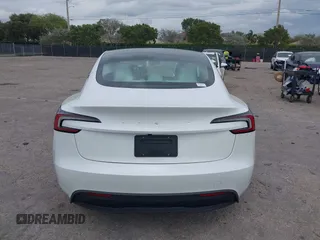 2025 Tesla Model 3 Long Range with VIN 5YJ3E1EA0SF932385, listed as a IAAI auction lot 41772613 with 1,683 mi miles and . Bid and sale history available at carsss.com. Image 16.