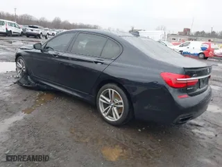 2019 BMW 7 Series 750i xDrive with VIN WBA7F2C56KB240271, listed as a IAAI auction lot 41111776 with 76875 miles. Bid and sale history available at carsss.com. Image 3.
