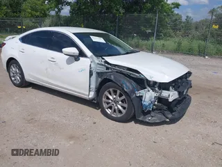 2015 Mazda 6 i Sport with VIN JM1GJ1U56F1214615, listed as a IAAI auction lot 42572205 with 152,371 mi miles and . Bid and sale history available at DreamBid. Image 1.